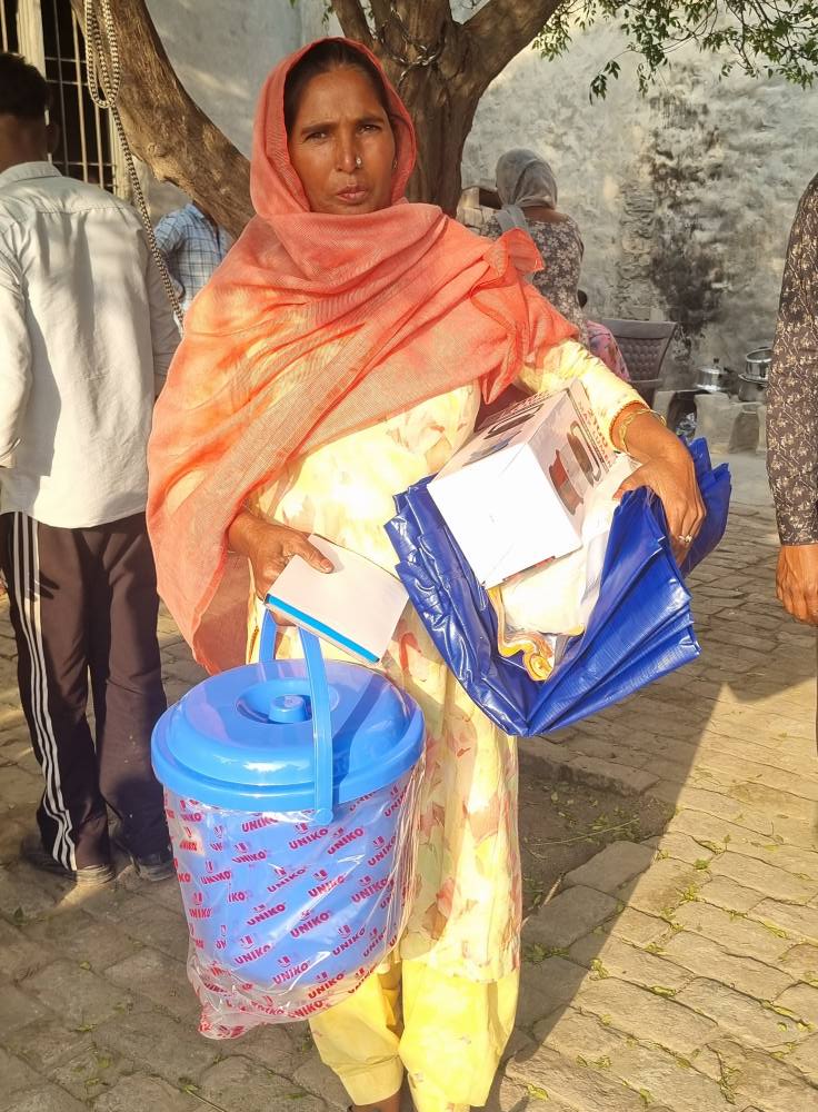Family Receiving Aid in Amritsar 2